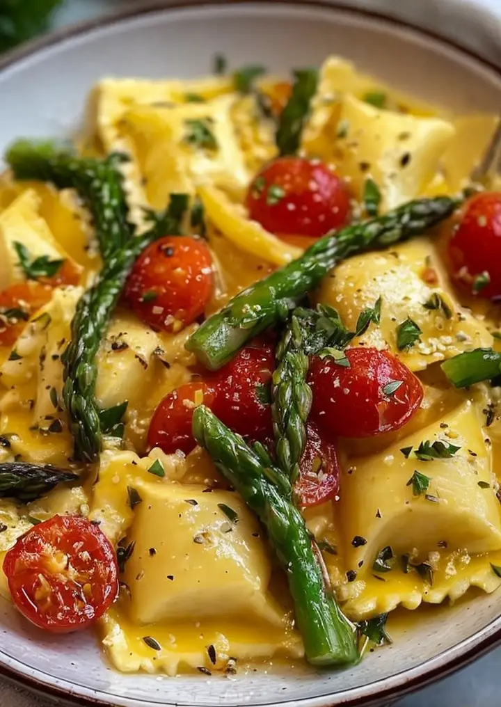 Irresistible Ravioli with Tomatoes, Asparagus, Garlic, and Fresh Herbs